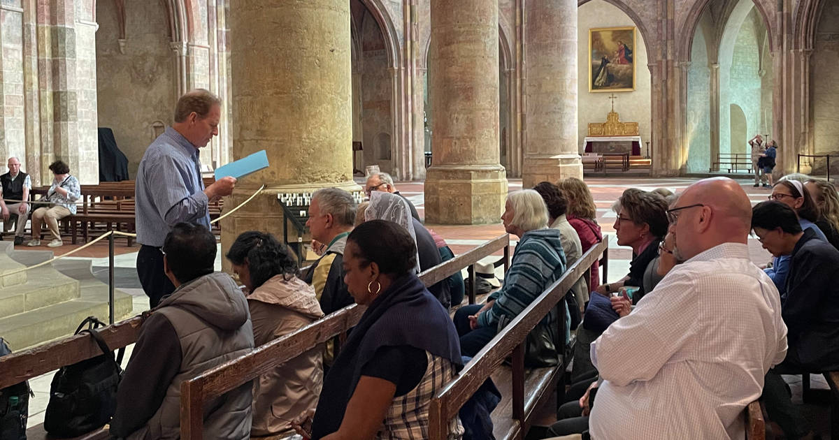 College President Dr. Timothy O'Donnell led pilgrims across France, including to the tomb of St. Thomas Aquinas.