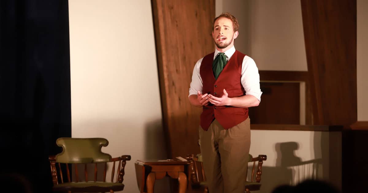 Junior Aron Forthofer performs in "Little Women."