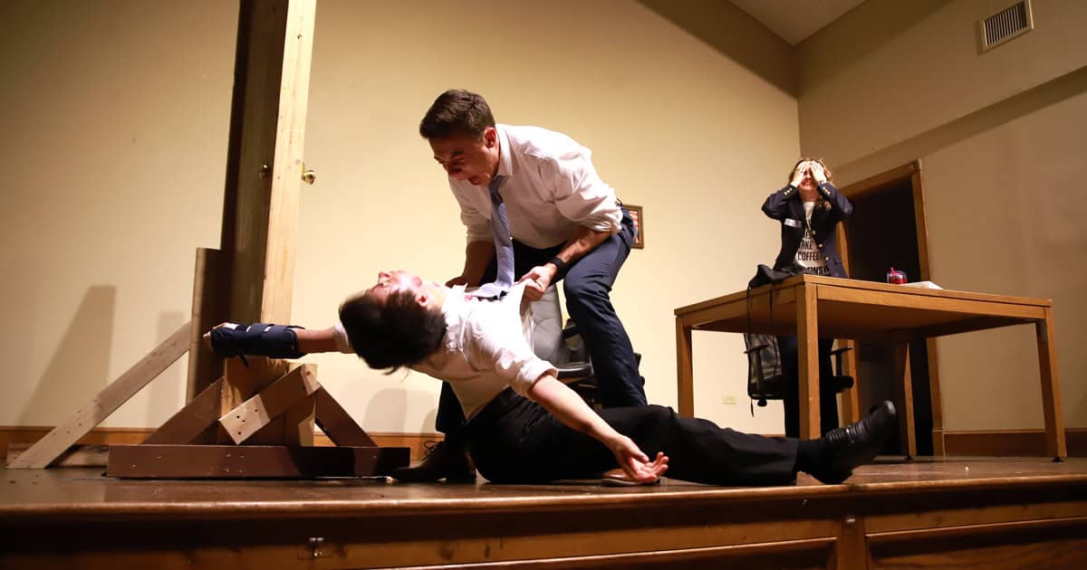 Students John Fowler (center), Giovanni Riguera-Petta (left) and Erin McLaughlin (right) in a scene from Mystery Dinner Theater.