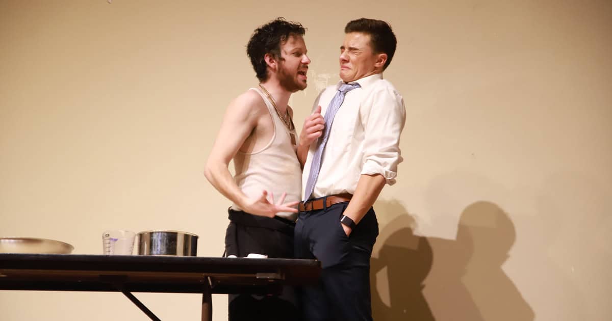 Stephen Simpson (left) and Fowler (right) in a scene from Mystery Dinner Theater.