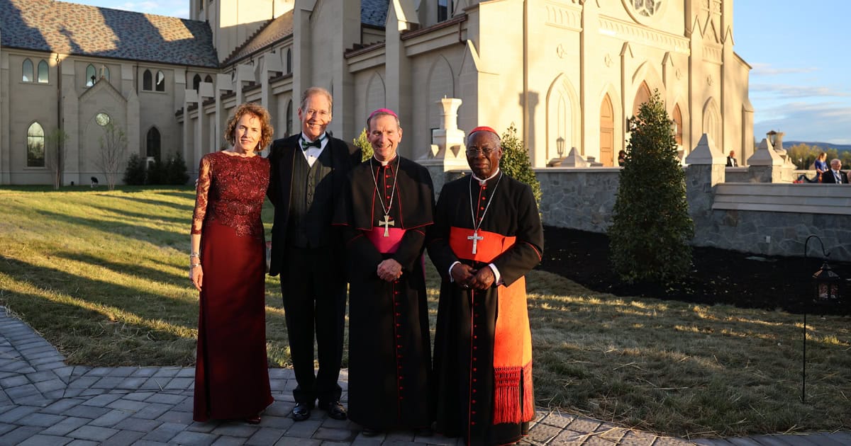 O’Donnells with Arlington Bishop Michael F. Burbidge and Francis Cardinal Arinze following the Dedication Mass of Christ the King Chapel in April 2023.