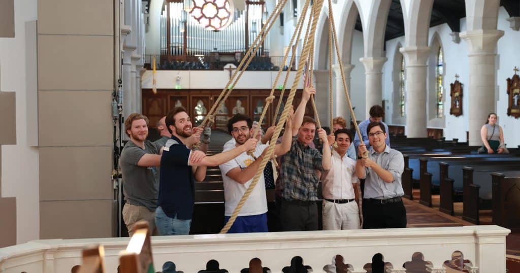 A group of senior men volunteered to help test the initial swinging of the botafumeiro in the chapel.