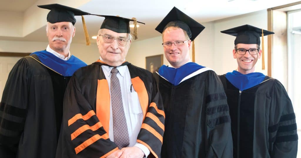 Over the decades, Dr. James Hitchcock taught generations of students, including Christendom’s own Dr. Michael Kelly (left), Dr. Brendan McGuire (center, may he rest in peace), and Dr. Christopher Lane (right).