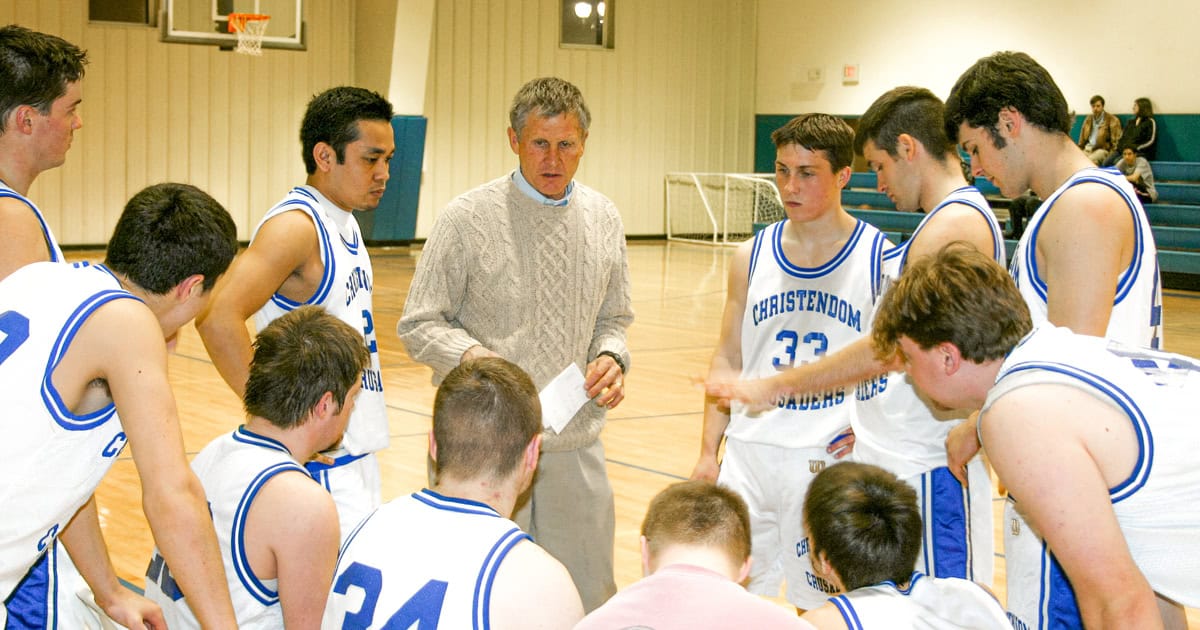 Tom coaching the men's basketball team at Christendom College.